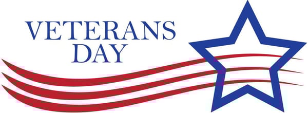The words Veterans Day above three red stripes and a blue star