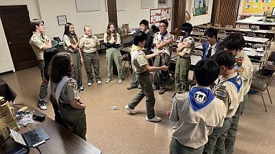 youth scouts standing in a circle